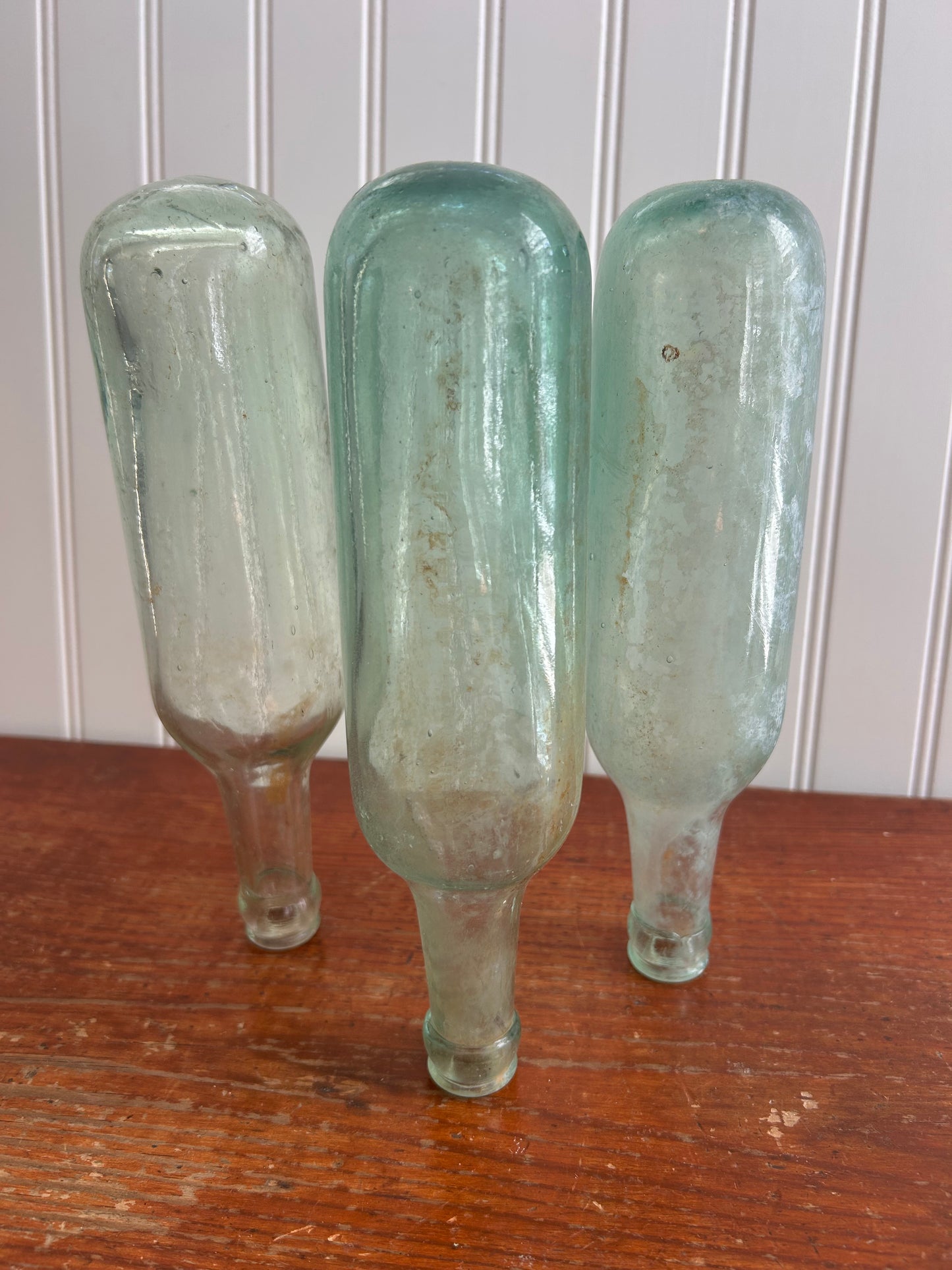 Antique Aqua Torpedo Bottles – Set of 3 – Round Bottom Dug Glass, 10”