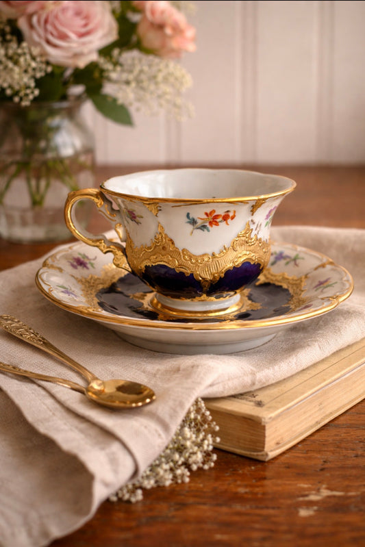 Meissen Porcelain Cup & Saucer – B-Form, Royal Blue & Gilt Strewn Flowers